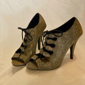 Size 8.5 Fioni Night Shimmery Gold Tie Heels